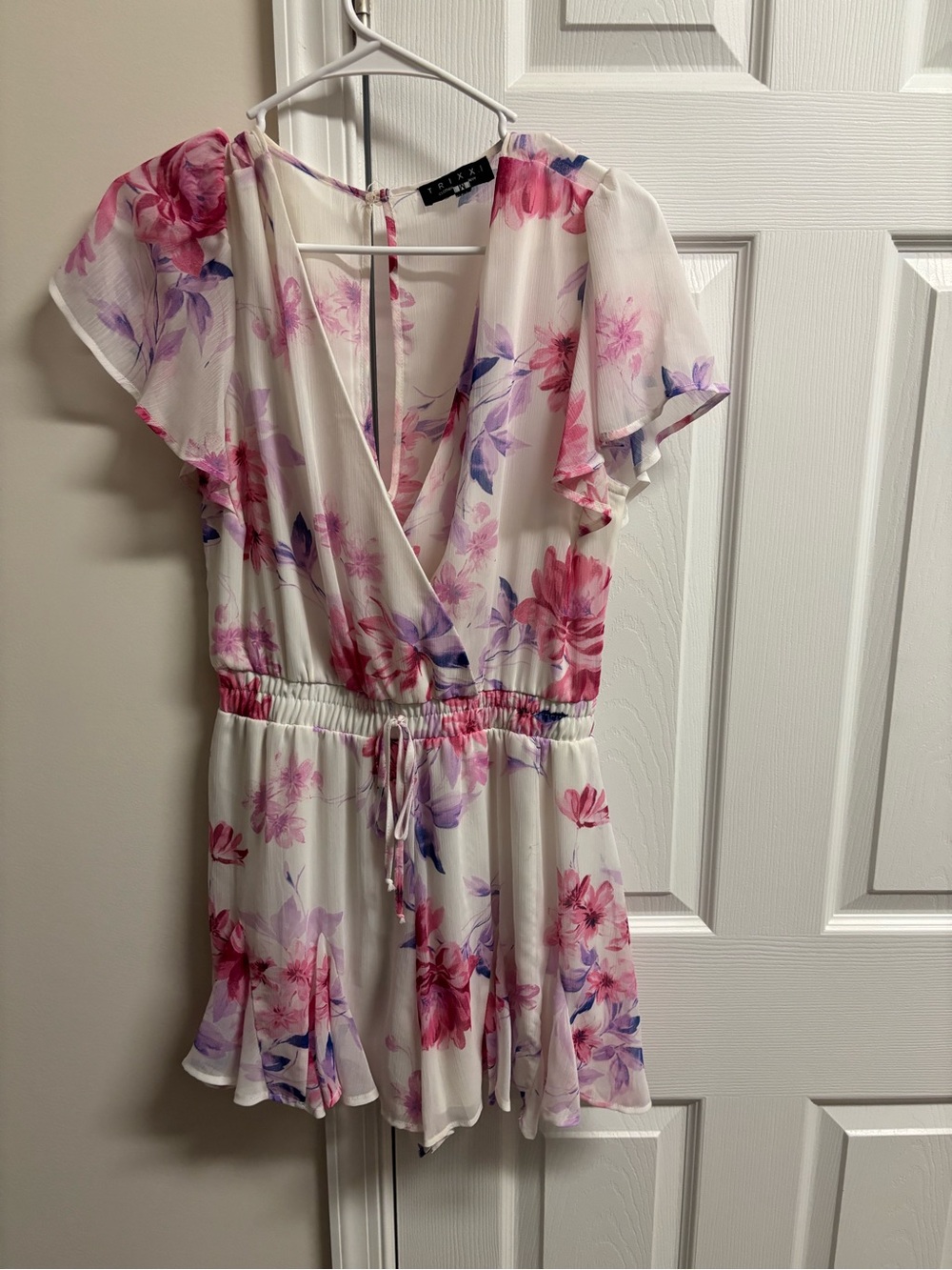 Francesca's Collections White Floral Surplice Romper with Pink & Purple Blooms